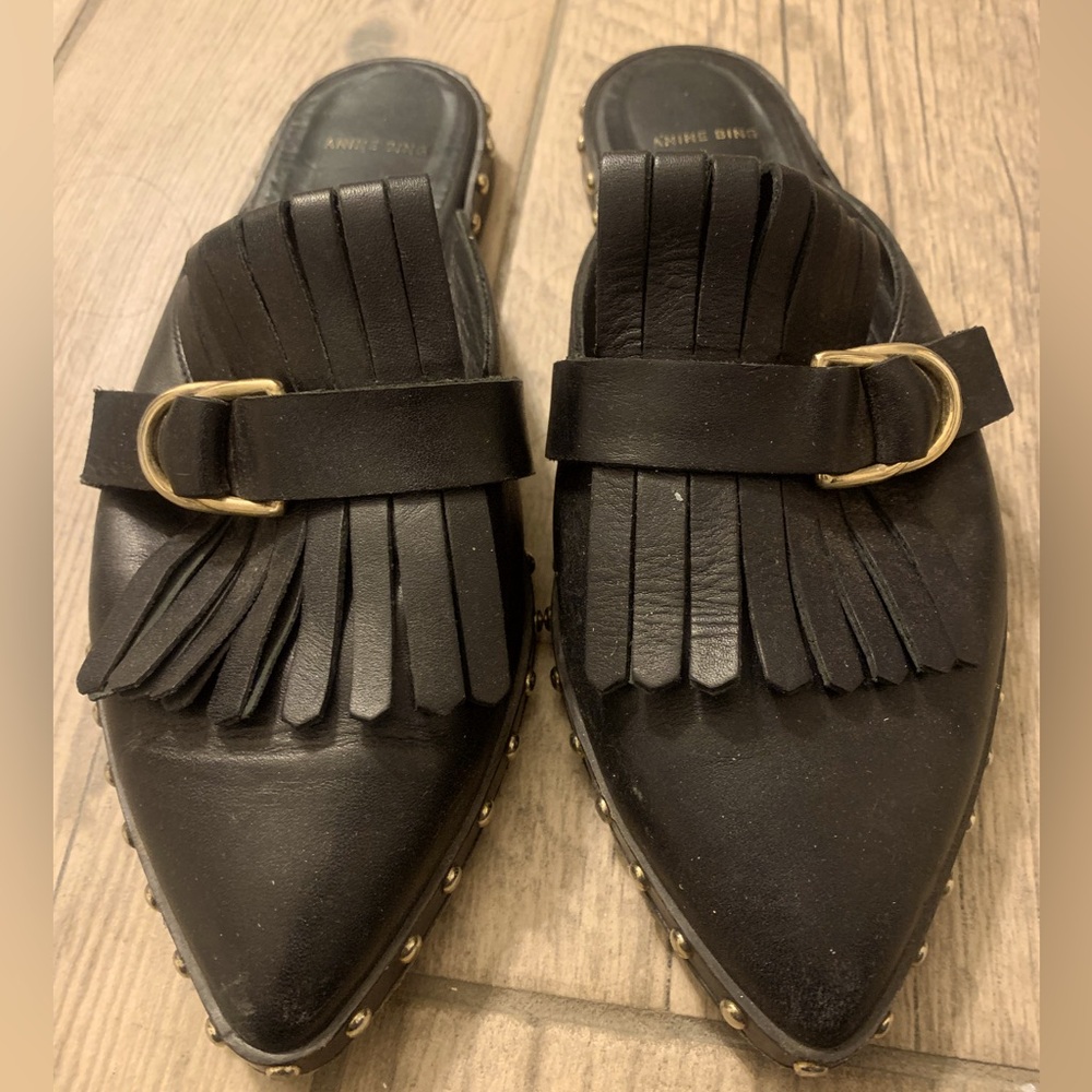 Black Anine Bing tasseled mule with gold stud detail. Size 6